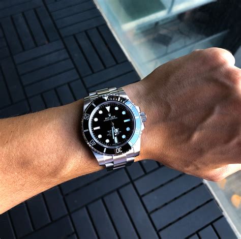 rolex submariner on the wrist